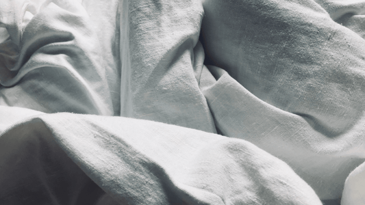 unfolded bed sheets